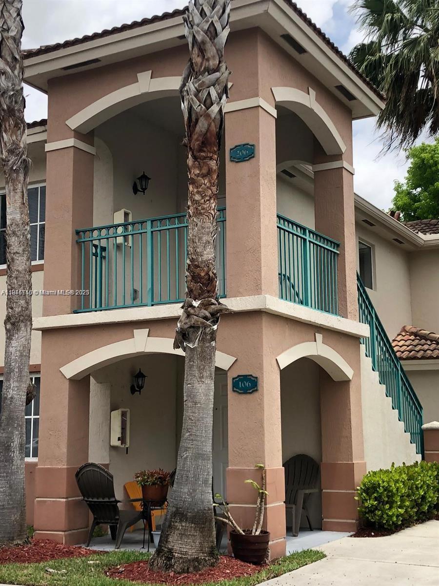 Beautiful 3 bedroom 2 bath, corner unit with private stairs and balcony, all tile floors, large pantry & large master
closet, washer and dryer inside the unit.