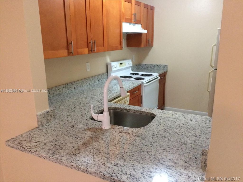 Photo of 1009 Twin Lakes Drive #29-A, Coral Springs, FL 33071 (MLS # A11453162)