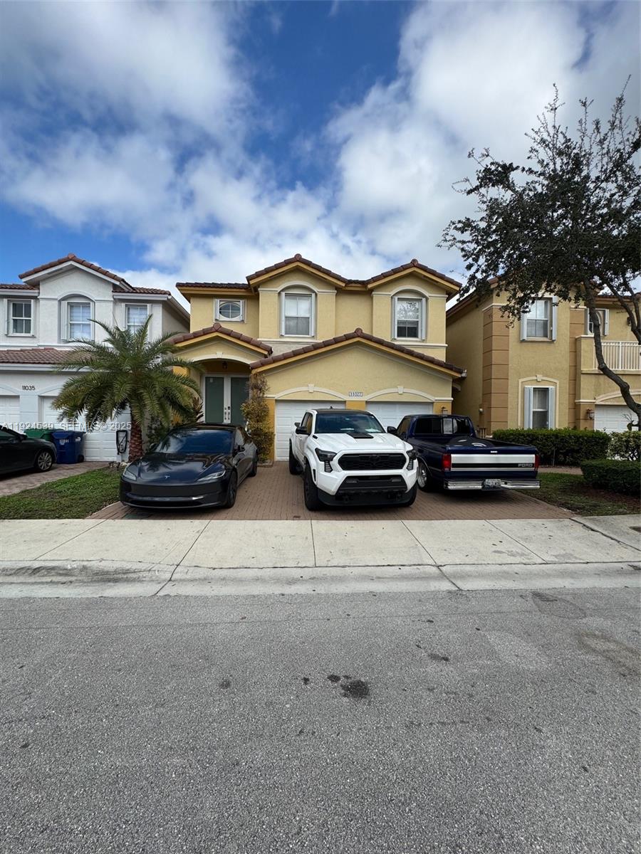 ISLANDS AT DORAL TOWNHOME - Residential