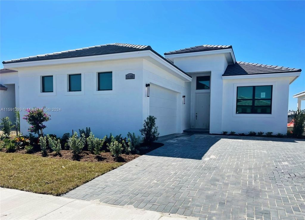 Photo of 11356 SW Pietra Way, Port Saint Lucie, FL 34987 (MLS # A11591399)