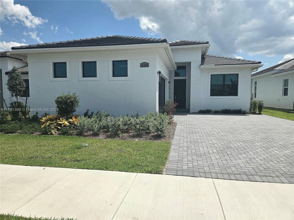 Photo of 11356 SW Pietra Way, Port Saint Lucie, FL 34987 (MLS # A11591399)