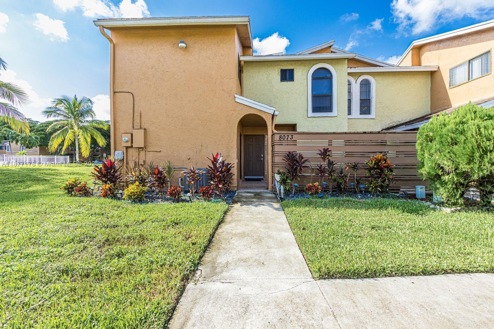 Light bright and spacious 3 Bed Rm 2.5 Bath Town House located in the desirable Subdivision of Tamarac Pineapple Park at Woodmont. This property is a corner unit which has 2 Parking Spaces in front. Spacious Master Bed Rm with sophisticated Bath Rm and Walk-in Closet. Two additional large Bedrooms with roomy Closets. The Gourmet Kitchen has Sliding Doors leading to one of the two Patios. Dining and Living Rm has a beautiful view of Screened in Patio as well as the Community Pool. Impact Windows. Close to Shopping, Restaurants and Entertainment.