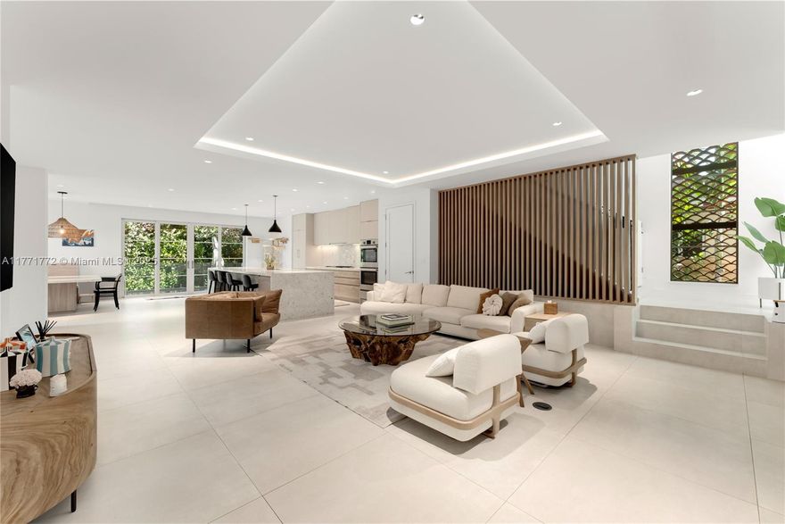Introducing this contemporary new construction home in Historic Morningside, offering 3,741 SF of sophisticated & airy living spaces. This stunning 4-beds, 4 full bathrooms & 2 half baths residence is designed for modern living, featuring a Savant smart home system & expansive open living & kitchen area. The chef’s kitchen is equipped w/ Bosch appliances, a grand island, a breakfast nook, & a light-filled dining area w/ a chic custom bar. The primary suite is a true sanctuary w/ dual en-suite bathrooms, walk-in closets, & a private wraparound terrace. A sparkling heated pool, outdoor shower & summer kitchen complete a luxurious outdoor setting, ideal for entertaining. Enjoy living in this guard- gated enclave in close proximity to the Design District, Wynwood & all that Miami has to offer.