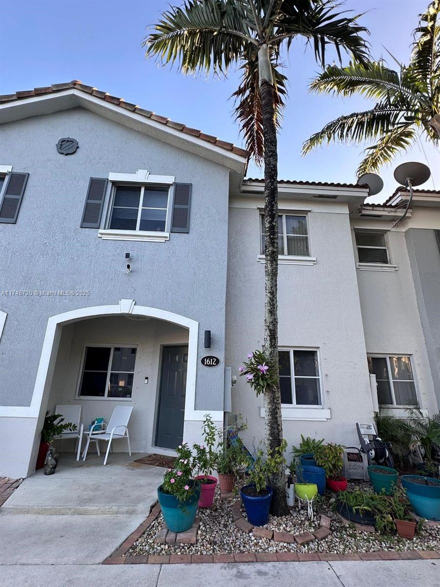 Welcome to tranquil lakefront living in Homestead! This charming townhouse boasts a spacious layout with warm laminate floors and a bright, open kitchen perfect for gatherings and everyday meals. Step out back to find a covered patio oasis overlooking the water. The primary bedroom provides a relaxing haven, while additional rooms cater to family, guests, or a home office. With a budget-friendly HOA, well-maintained community surroundings, and easy access to local amenities, this home offers the ideal balance of comfort and convenience. Don’t miss the chance to enjoy all that lakefront living has to offer!