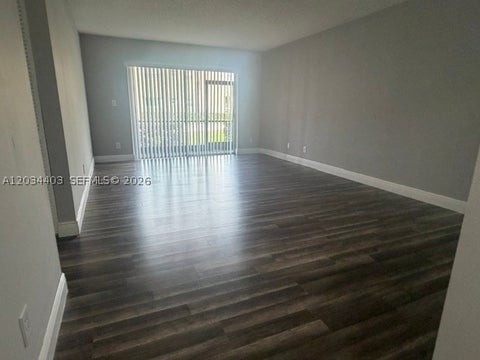 Photo of 4147 NW 90th Ave #102, Coral Springs, FL 33065 (MLS # A12034403)