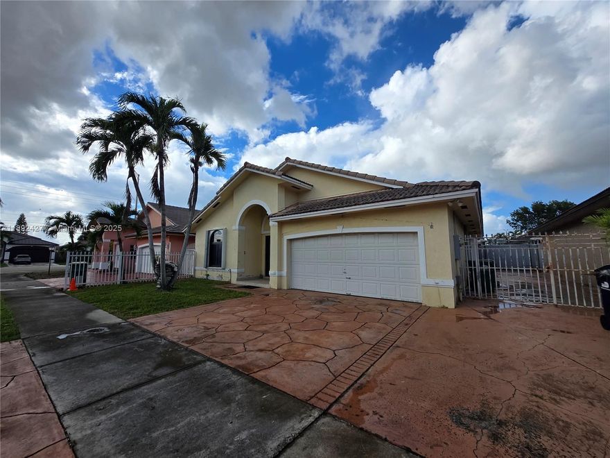 Sacious 3-bedroom, two-bath house, Close to SW 8 Street and 142 Ave. Has a two-car garage and no association. Section 8 OK.