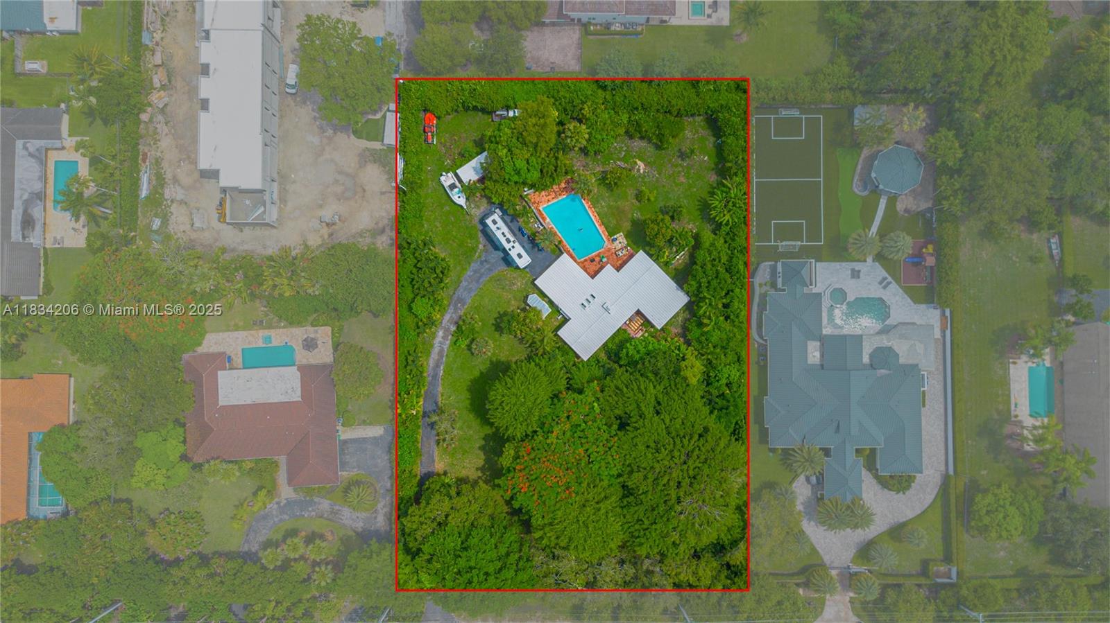 Imagine owning one of Pinecrest's most expansive lots, an impressive 1.3+ acre property tucked away in a serene South Pinecrest neighborhood. This extraordinary parcel presents limitless possibilities to construct your custom dream home or a sprawling private compound. The land beautifully balances open, grassy areas with a mature tree canopy, guaranteeing ultimate privacy and tranquility. Plus, you'll benefit from easy access to both Old Cutler Road and Ludlam Road, connecting you effortlessly to the best of the area.