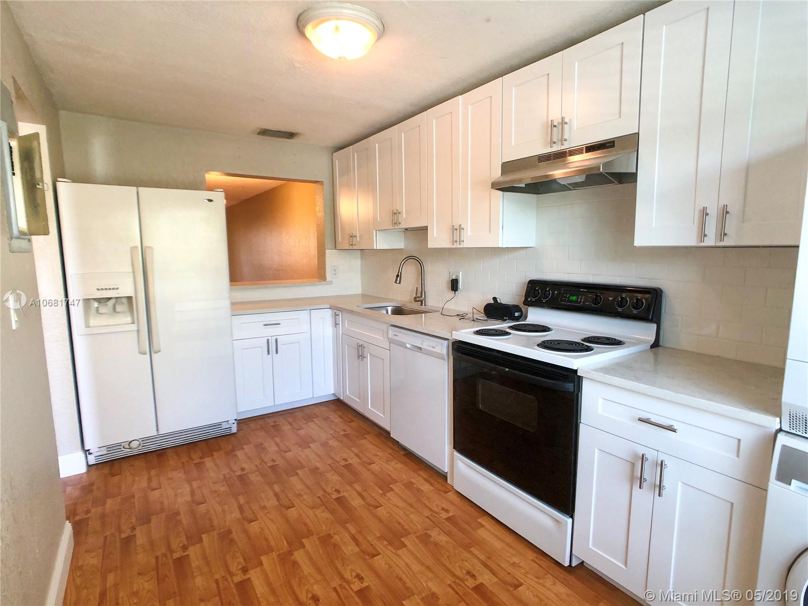 Beautifully updated 2/2.5 townhouse in the heart of Pembroke Pines. New kitchen & appliances, hurricane windows, wood laminate floors, updated baths, high efficiency washer/dryer, and very spacious with plenty of storage and closet space. Screened in porch just a few steps away from pool. Immediate occupancy after approval by association (see attachments for app). Initial Requirements: 1st Month's rent and 2 month's security deposit to move in. Please note: Owner requires a non-refundable pet deposit of $300. Min. 1 yr lease, renewable. Easy to show, use show assist. Max Pet weight 25 lbs. Rules & Regs in the attachment section as well as an application for occupancy to COA. Note: HOA to fix front step.
