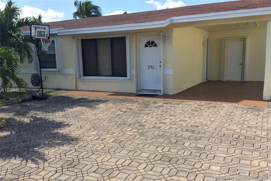 Fully renovated 3/2 home: roof, kitchen, bathrooms, tile floors, ceiling fans throughout, electric heating & AC, nicely landscaped with palms & fruit trees & fully gated for security, accordion hurricane shutters for safety, electric washer & dryer in utility room included, professionally managed/attentive landlord. Quite neighborhood with easy access to highways, shopping, schools & places of worship nearby. On Supra.