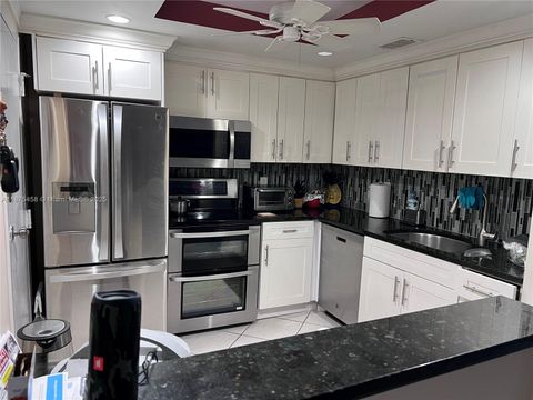 Photo of 6600 Cypress Rd #504, Plantation, FL 33317 (MLS # A11875458)