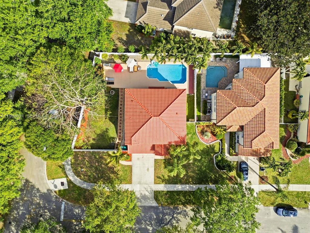 Photo of 5821 NW 62nd St, Parkland, FL 33067 (MLS # A11994621)