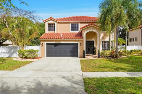 Photo of 5821 NW 62nd St, Parkland, FL 33067 (MLS # A11994621)