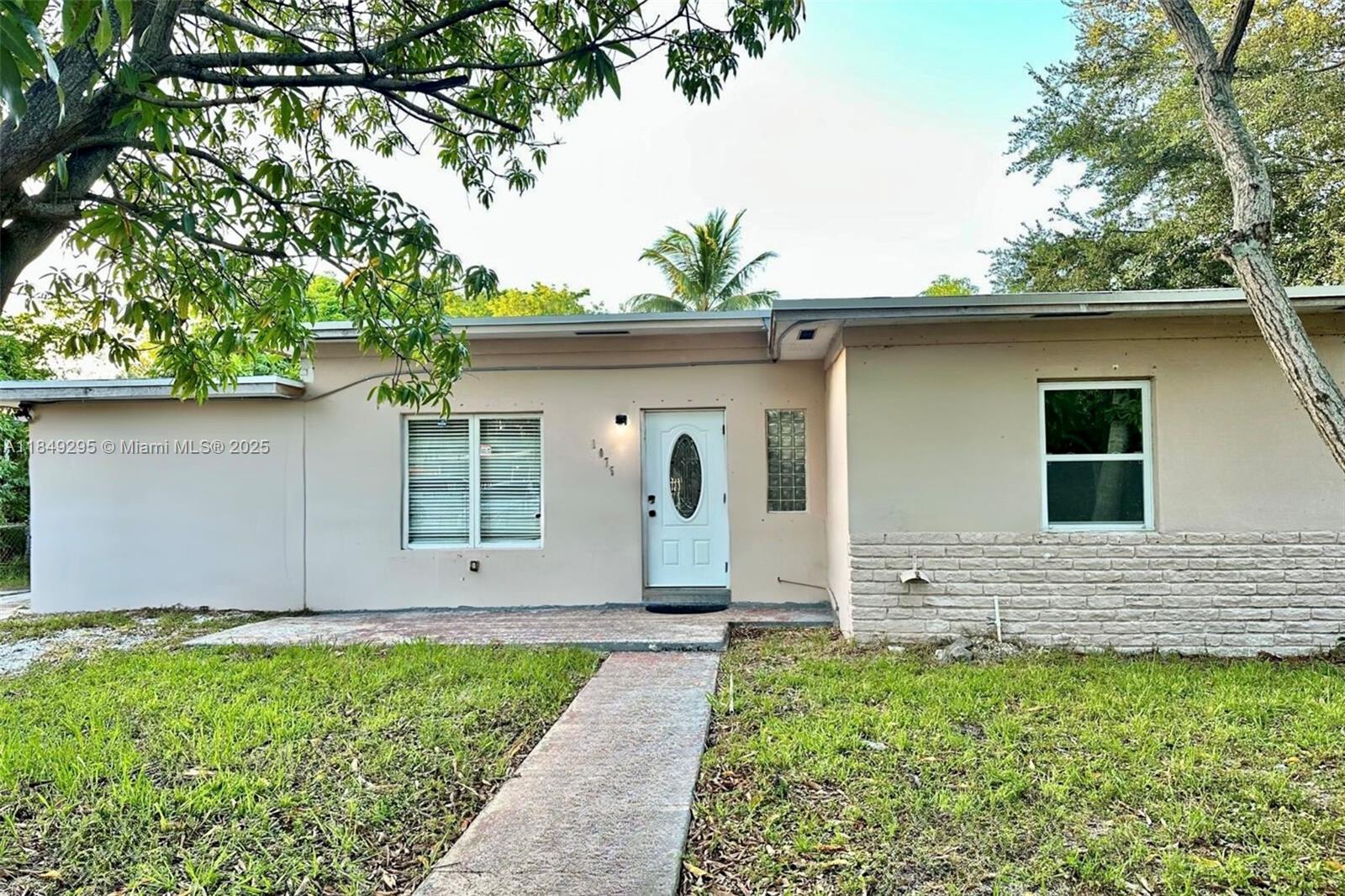 Welcome to this spacious 4-bedroom, 2-bath home offering 1,571 sq ft of functional living space in a desirable North Miami neighborhood! Featuring a flexible layout with addtional room that can serve as a 4th bedroom, home office, in-law quarters, studio or efficiency. A separate laundry room adds everyday convenience, and the oversized front and backyard provide plenty of space to relax, garden, or entertain. New roof installed in August 2023. Whether you're an owner-occupant or investor, this home is competitively priced and ready to sell. Don’t miss out!