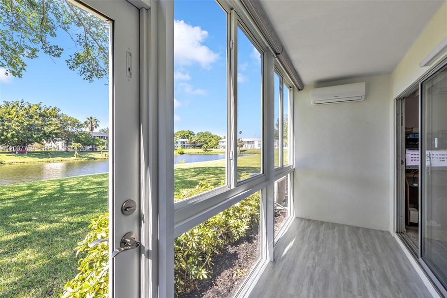 Fantastic 2 bedroom 1 and 1/2 bath water view Condo. New AC ,new Roof, Florida room has been redone with storm glass and doors, new flooring and new room AC. This is a well-kept condo with everything working great including the electric blinds. Enjoy your beautiful view or head over to Le Club or enjoy the 5 Star world class clubhouse complete with Theater, Fitness and exercise rooms, resort pool, Art,Music,Ceramic, Woodworking and over 70 clubs to join, just endless activities. This ground floor is ready to go and well-priced. Do not miss this one, easy to show. Fine dining and quality shopping all close by.