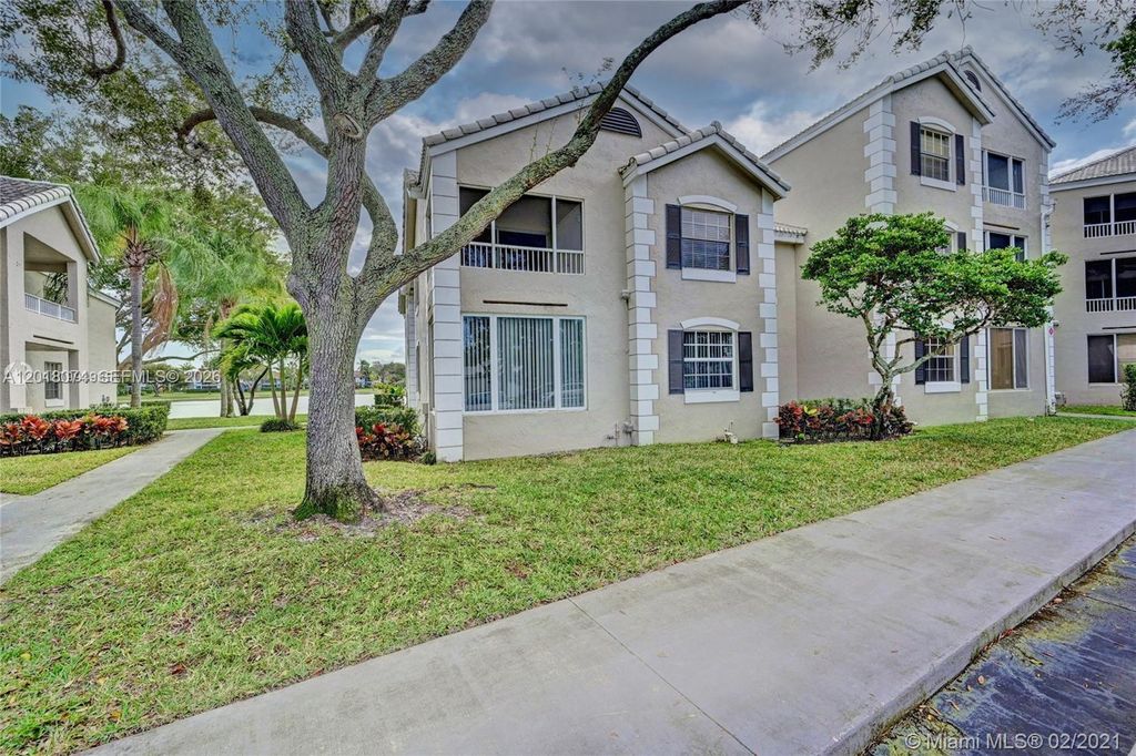 Photo of 2850 N Oakland Forest Dr #202, Oakland Park, FL 33309 (MLS # A12018074)