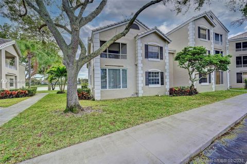 Photo of 2850 N Oakland Forest Dr #202, Oakland Park, FL 33309 (MLS # A12018074)