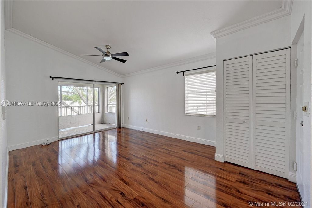 Photo of 2850 N Oakland Forest Dr #202, Oakland Park, FL 33309 (MLS # A12018074)