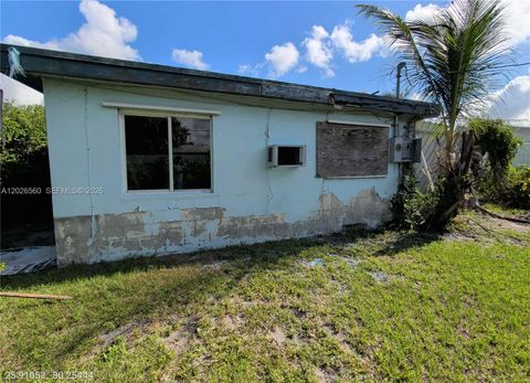 Tiny photo for 820 Curtiss Dr, Opa Locka, FL 33054 (MLS # A12026560)
