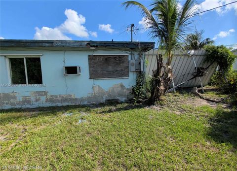 Tiny photo for 820 Curtiss Dr, Opa Locka, FL 33054 (MLS # A12026560)