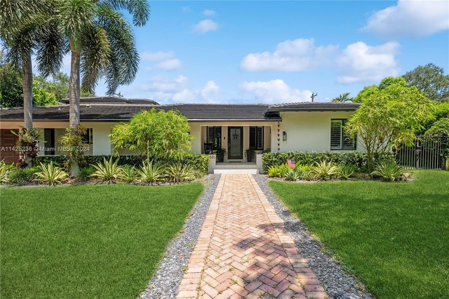 Be prepared to be captivated from the moment you arrive. Located on a beautiful tree lined street in the prestigious Golden Triangle neighborhood in Coral Gables, this tastefully renovated home features an open concept kitchen with a stunning island that seats 8+ people. The kitchen boasts a seamless look with its built-in Thermador appliances. The large terrace nestled in a meticulously landscaped backyard has a built-in BBQ, mini fridge, ice maker, sink and heated pool allowing for year round outdoor relaxing. The latest technology was incorporated with a fully integrated high tech sound system, indoor/outdoor speakers, Nest thermostats and outdoor cameras. New roof and a/c, impact windows, and steam shower in the primary bath. This lovey home is a must see.