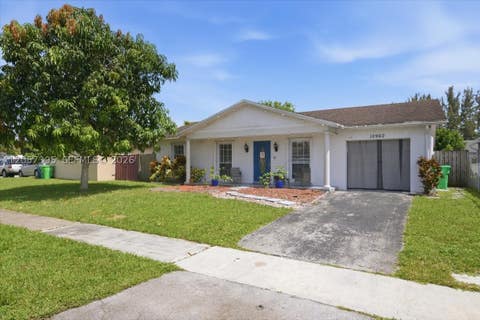 Photo of 10960 NW 21st St, Sunrise, FL 33322 (MLS # A12057395)