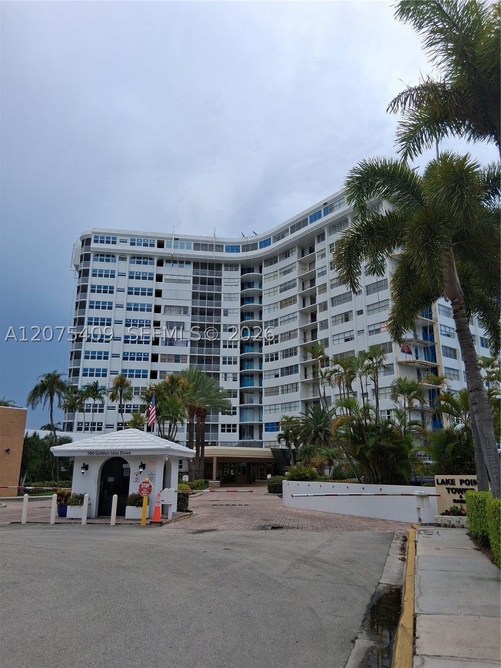 Photo of 100 Golden Isles Dr #206, Hallandale Beach, FL 33009 (MLS # A12075409)