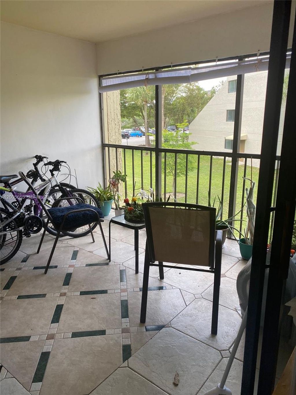 Photo of 220 Lakeview Dr #203, Weston, FL 33326 (MLS # A12005665)