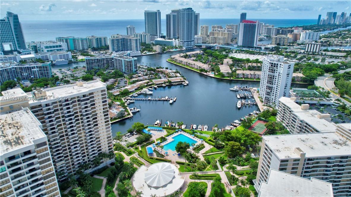 Welcome to the Olympus ,This Large 2 bedroom 2 bath unit is located in a Luxury complex! Features Include the following: Renovated eat in Kitchen w/ new SS appliances, Large open floor plan Living room and dining room that leads to an open balcony overlooking the intercoastal with stunning water & sky line views, 2nd Bedroom easily opens to use as a den if desired, All new Black out blinds in bedrooms & New Sun Screen window treatments in living room, 2 full Bathrooms, walk in closets & ALL NEW HURRICANE INPACT WINDOWS!! 5-star amenities include: 24 hour security, Headed Pool, Tennis courts & newly renovated state of the art gym. PRIME LOCATION: Close to luxury restaurants, Aventura Mall and only 1/2 mile to the beach A-1 MOVE IN CONDITION! SETTLEMENT of FAMILY TRUST -THIS UNIT IS A DEAL