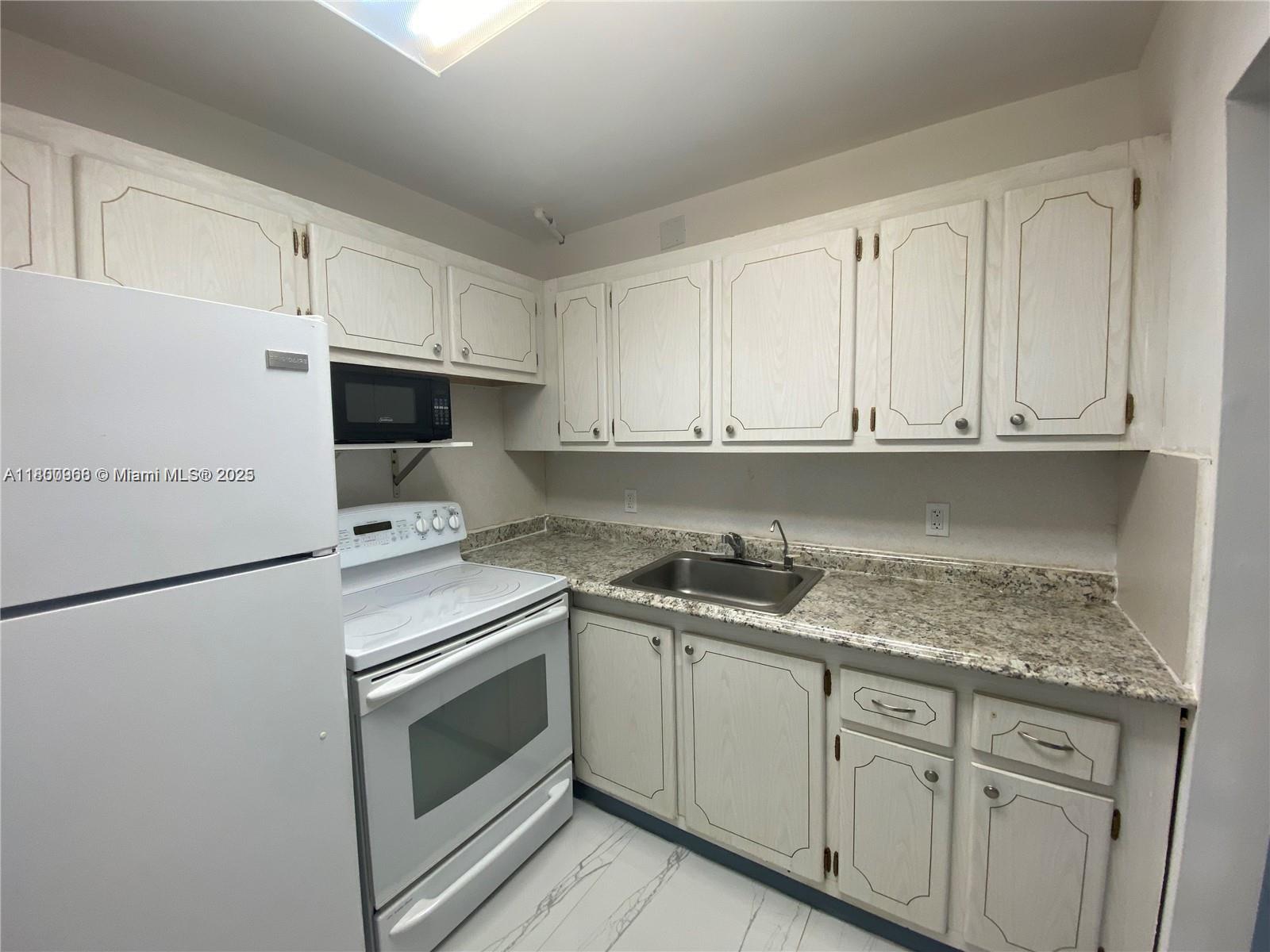 Move-in ready Unfurnished unit in a 55+community of Century Village. This well cared for, recently partially updated unit condo is waiting for a new tenant. Quiet and nice place.ceramic floors through - out, you will love the easy access to your parking space from the enclosed pati, Next door laundry. Community offers a free shuttle bus, clubhouse with variety of amenities, card rooms, theater restaurant, tennis, pickleball, Indoor and outdoor pools, movie theater with live shows, Shuttle services to Malls and Groceries, Club room and much more.. Is like leaving in a resort.
Property also is for sale.