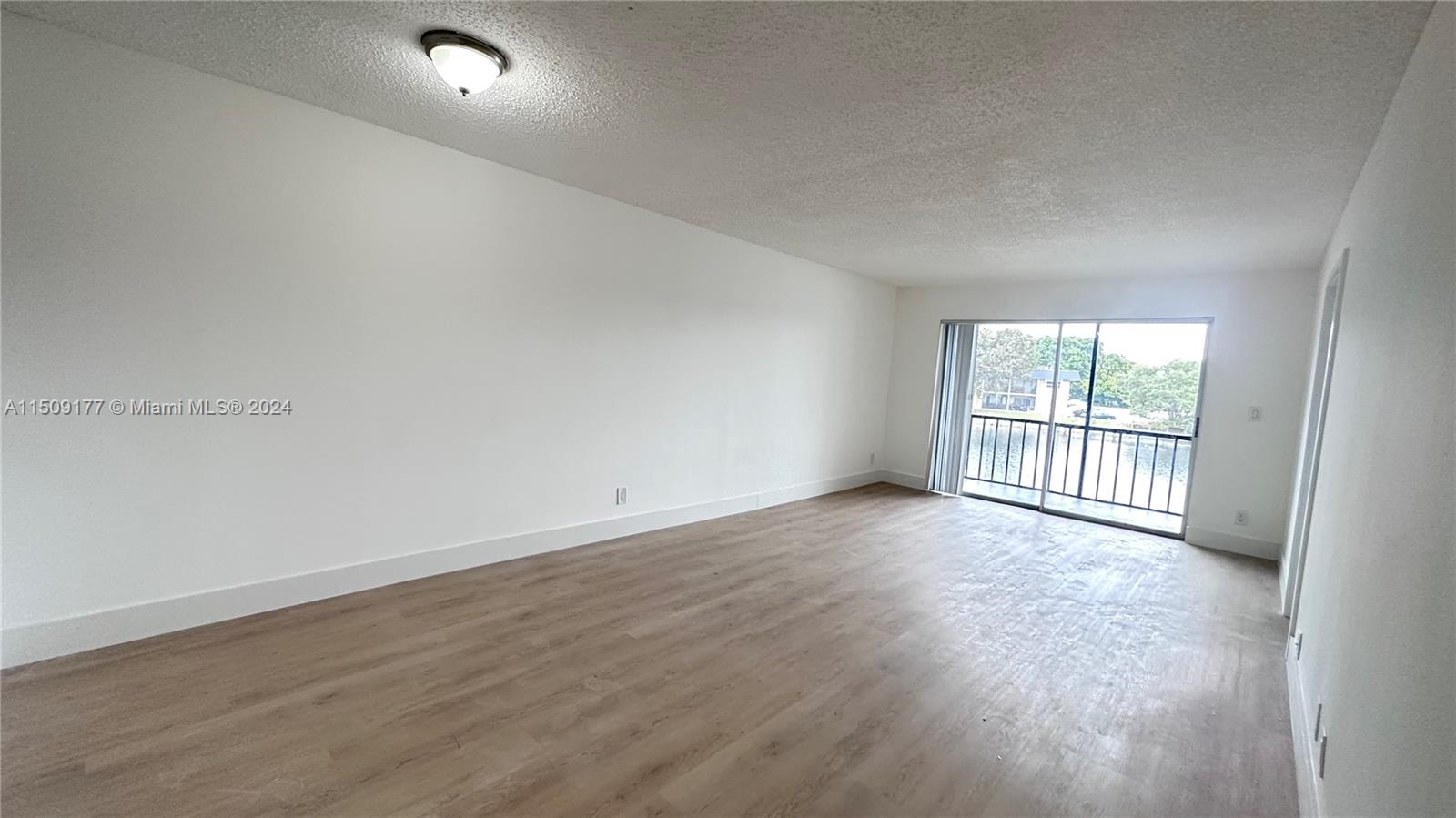 Beautiful and bright 2/2 split floor plan condo with water view!!  this home has updated bathrooms and beautiful kitchen cabinets with LED up lighting. Building exterior has been updated as well with new tile, new paint and new roofs.  Gated community in a desirable neighborhood with 2 pools, clubhouse, tennis courts, fitness room, basketball courts and picnic areas.