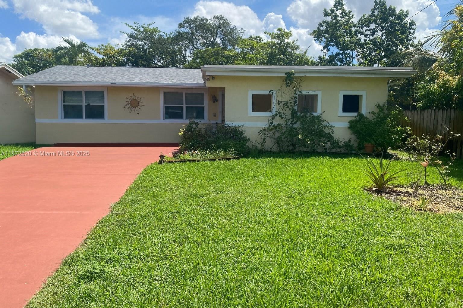 Welcome to this beautifully updated 3/2 waterfront home located in a sought-after beachside community, offering ocean access with only one fixed bridge—just 15–20 minutes to open water by boat and close to Las Olas, the beach and highways. Inside, you’ll find tile floors throughout, a 2020 roof, and a modern kitchen with granite countertops, s/s appliances, stone tile mosaic backsplash, and brand-new refrigerator. Updated bathroom features a glass-door shower, new vanity, and new tile. Hurricane impact windows, along with a large laundry room complete with washer, dryer, and a second refrigerator. Outdoor living includes screened in porch, plus a spacious backyard deck. Walking path, playground, and chicken coop to complete this backyard oasis. Fruit trees avocado, lemon, olive and more!
