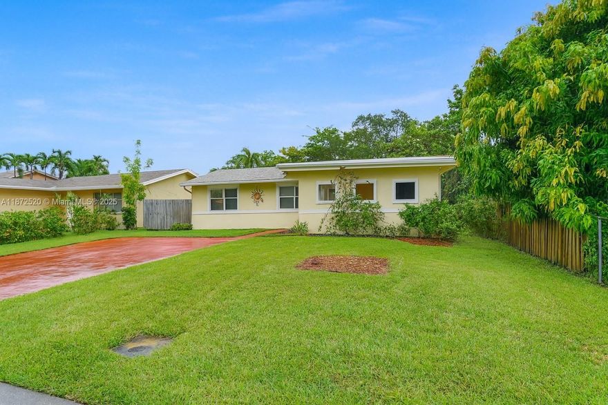 Welcome to this beautifully updated 3/2 waterfront home located in a sought-after beachside community, offering ocean access with only one fixed bridge—just 15–20 minutes to open water by boat and close to Las Olas, the beach and highways. Inside, you’ll find tile floors throughout, a 2020 roof, and a modern kitchen with granite countertops, s/s appliances, stone tile mosaic backsplash, and brand-new refrigerator. Updated bathroom features a glass-door shower, new vanity, and new tile. Hurricane impact windows, along with a large laundry room complete with washer, dryer, and a second refrigerator. Outdoor living includes screened in porch, plus a spacious backyard deck. Walking path, playground, and chicken coop to complete this backyard oasis. Fruit trees avocado, lemon, olive and more!