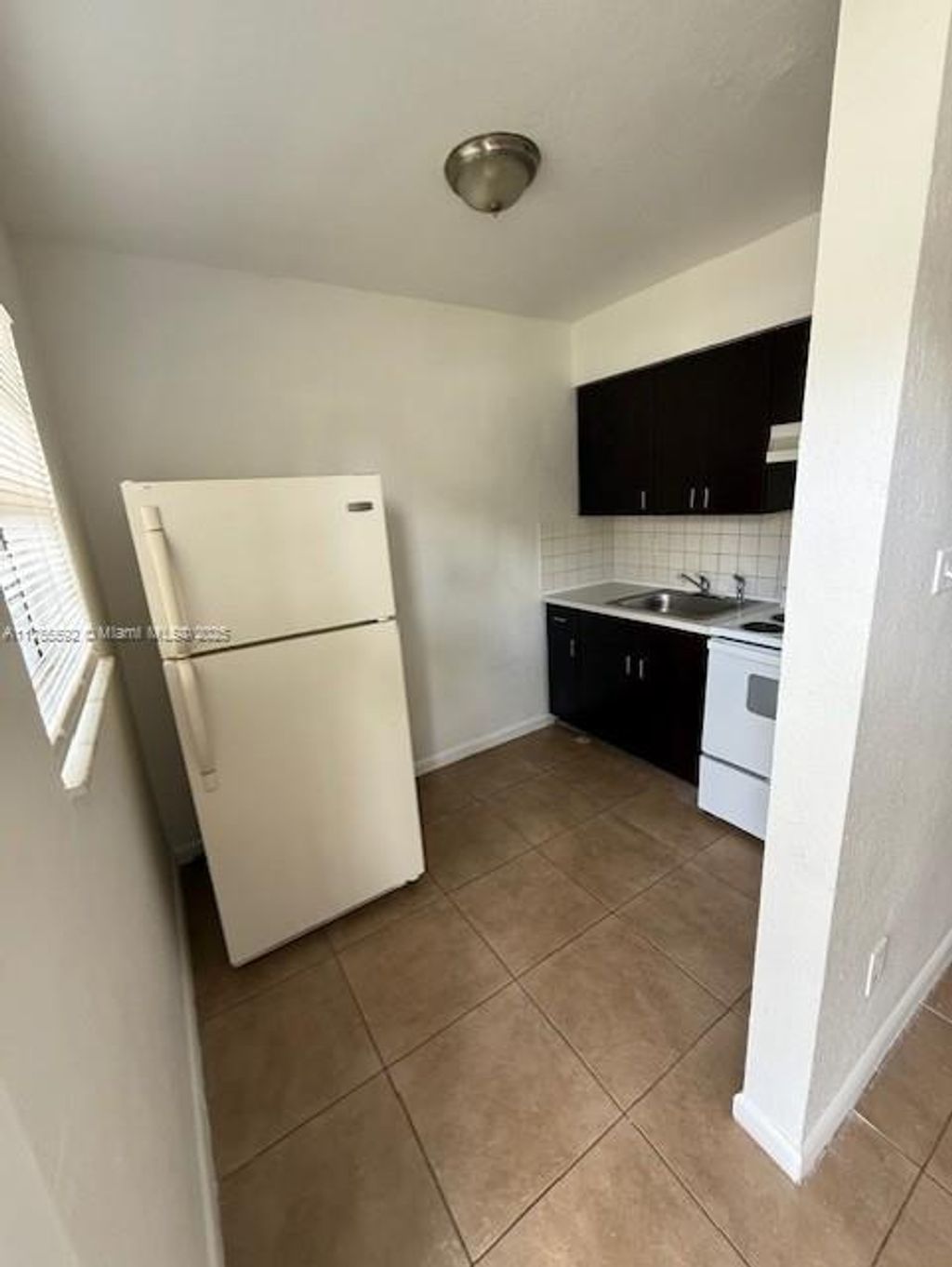 Photo of 2554 NW 14th St #6, Fort Lauderdale, FL 33311 (MLS # A11755592)