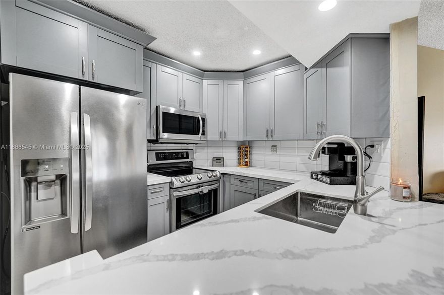 Beautifully updated 2 bedroom, 2 bathroom unit offering over 1,000 sq. ft. of comfortable living space in a private Plantation location. The modern kitchen features sleek finishes and ample cabinetry, while the in-unit washer/dryer adds everyday convenience. The spacious primary suite includes a walk-in closet, and abundant storage can be found throughout. A screened-in patio overlooks the serene water, perfect for relaxing. Entry is on the first floor with stairs immediately inside leading up to the unit. This home is tucked away yet close to Veterans Park, shopping, dining, and major highways. Substantially remodeled and move-in ready—plus, it’s currently the only 2/2 available in the neighborhood!