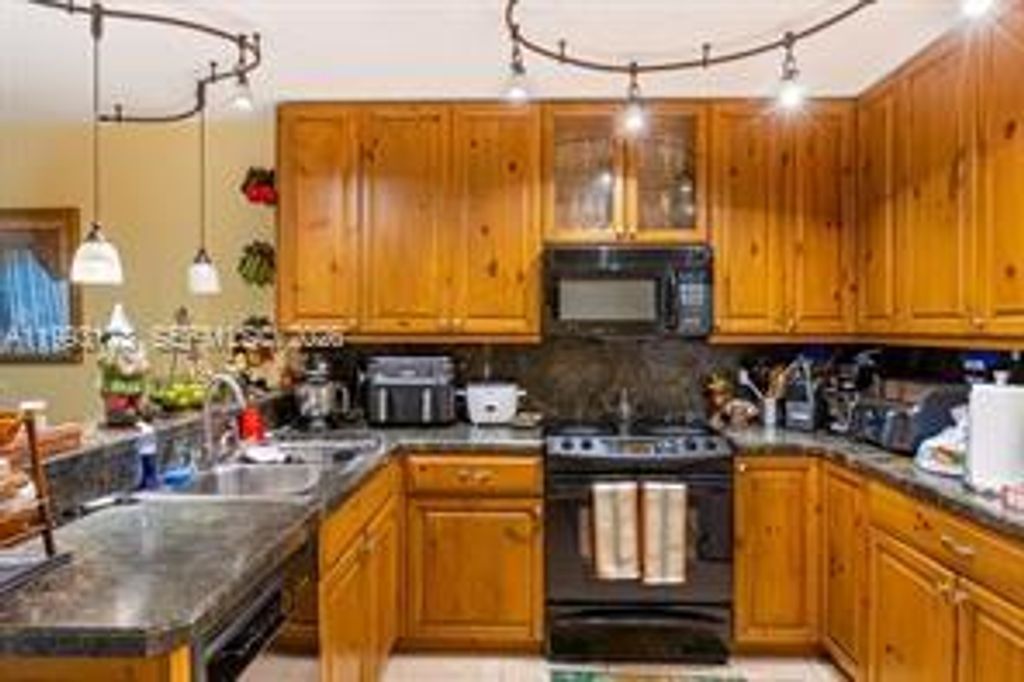 Photo of 7651 NW 74th Ave #1, Tamarac, FL 33321 (MLS # A11993173)