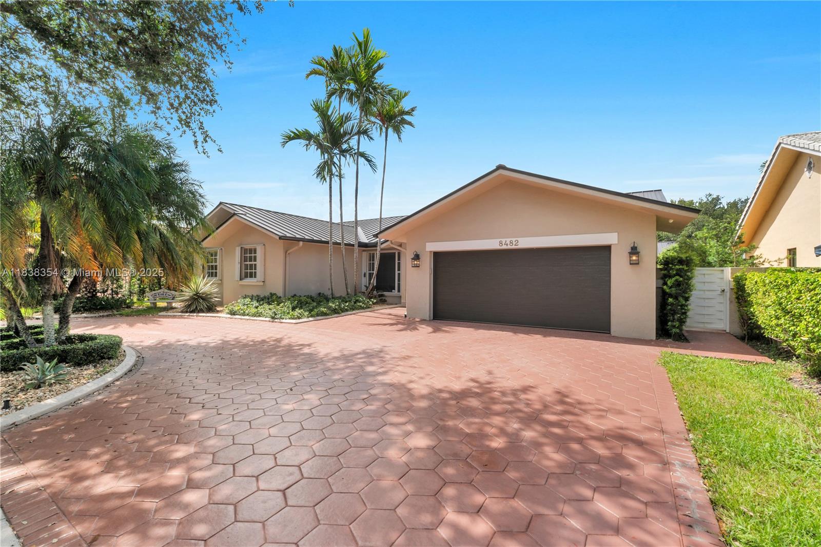 Charming and well-kept 4-bedroom, 3-bath single-story home available for rent in the desirable gated community of Royal Oaks. This spacious residence offers distinct living, dining, and family areas, creating a comfortable and functional layout for everyday living. The eat-in kitchen looks out to a serene saltwater pool and Jacuzzi, ideal for enjoying sunny Florida days or hosting guests. The home includes a 2-car garage and is located on a quiet street surrounded by mature trees. Pool and landscaping services are included in the rent. Conveniently located near great schools, shopping centers, dining, and major highways.