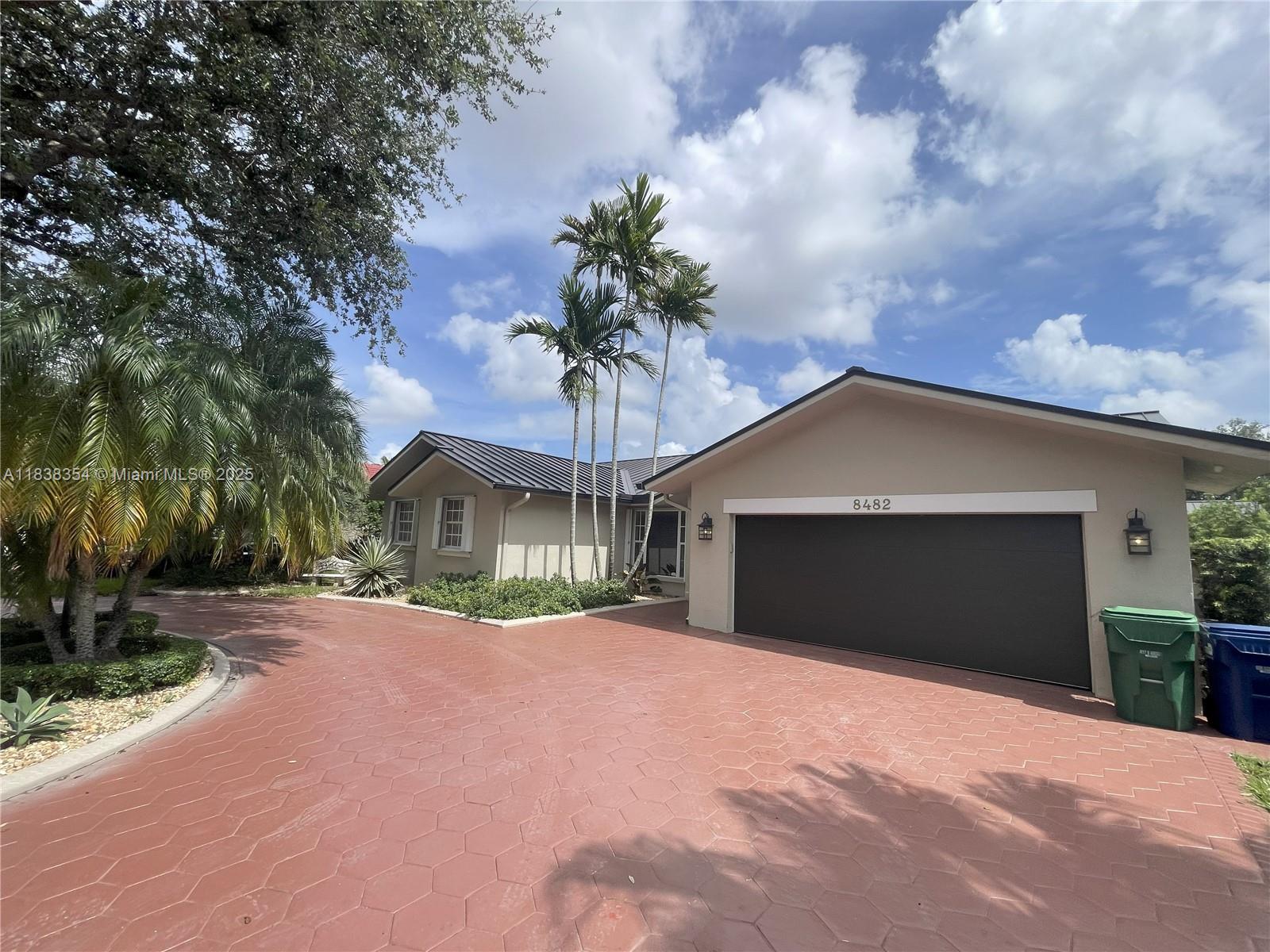 Charming and well-kept 4-bedroom, 3-bath single-story home available for rent in the desirable gated community of Royal Oaks. This spacious residence offers distinct living, dining, and family areas, creating a comfortable and functional layout for everyday living. The eat-in kitchen looks out to a serene saltwater pool and Jacuzzi, ideal for enjoying sunny Florida days or hosting guests. The home includes a 2-car garage and is located on a quiet street surrounded by mature trees. Pool and landscaping services are included in the rent. Conveniently located near great schools, shopping centers, dining, and major highways.