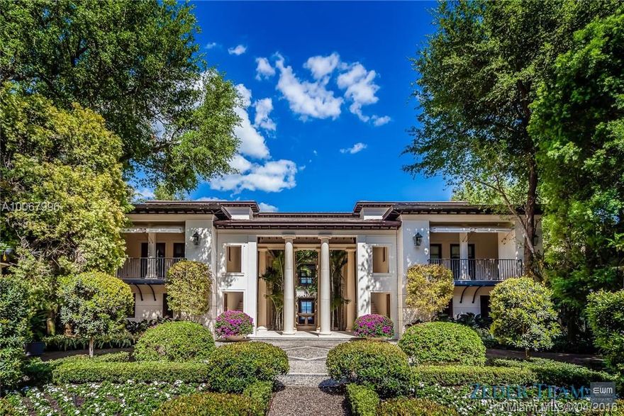 With 155.2 ft. of breathtaking waterfront in the renowned gated community of Tahiti Beach, this opulent 3-story Palladian-style home features unrivaled bay views. Upon entering the Ramon Pacheco/Jonathan Hogg designed home, one is welcomed by a beautifully landscaped serene garden which sets the tone for what is inside. With no expense spared, designer finishes and attention to detail throughout highlight the home while providing unobstructed views of the bay, swimming pool, garden, and 52.3 ft. dock.