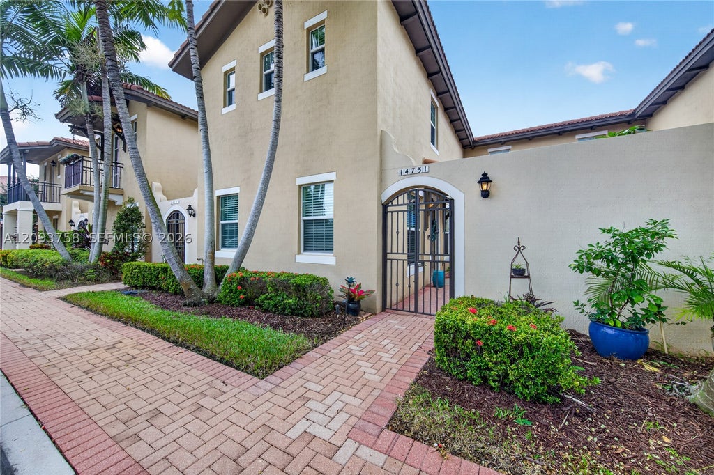 Photo of 14731 SW 15th Ct, Pembroke Pines, FL 33027 (MLS # A12093758)