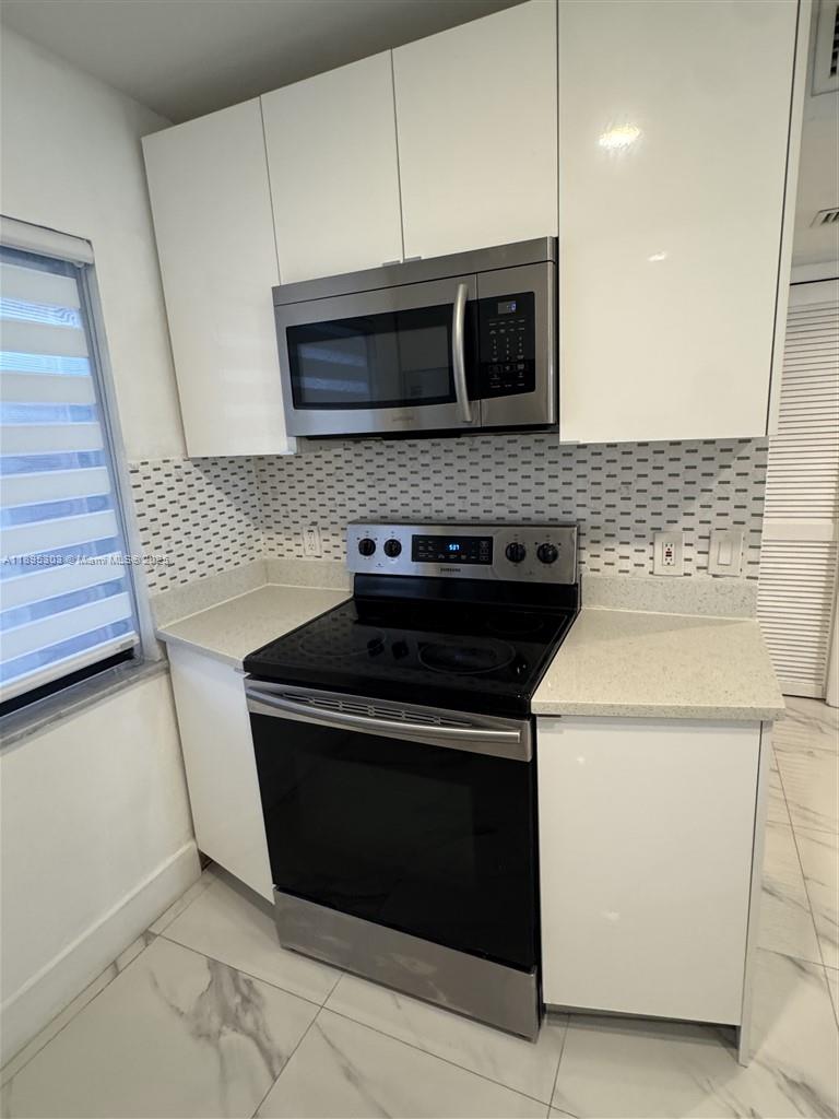 RACQUET CLUB APARTMENTS A - Residential Lease