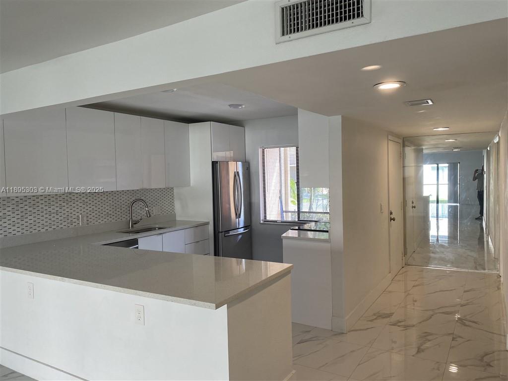 RACQUET CLUB APARTMENTS A - Residential Lease