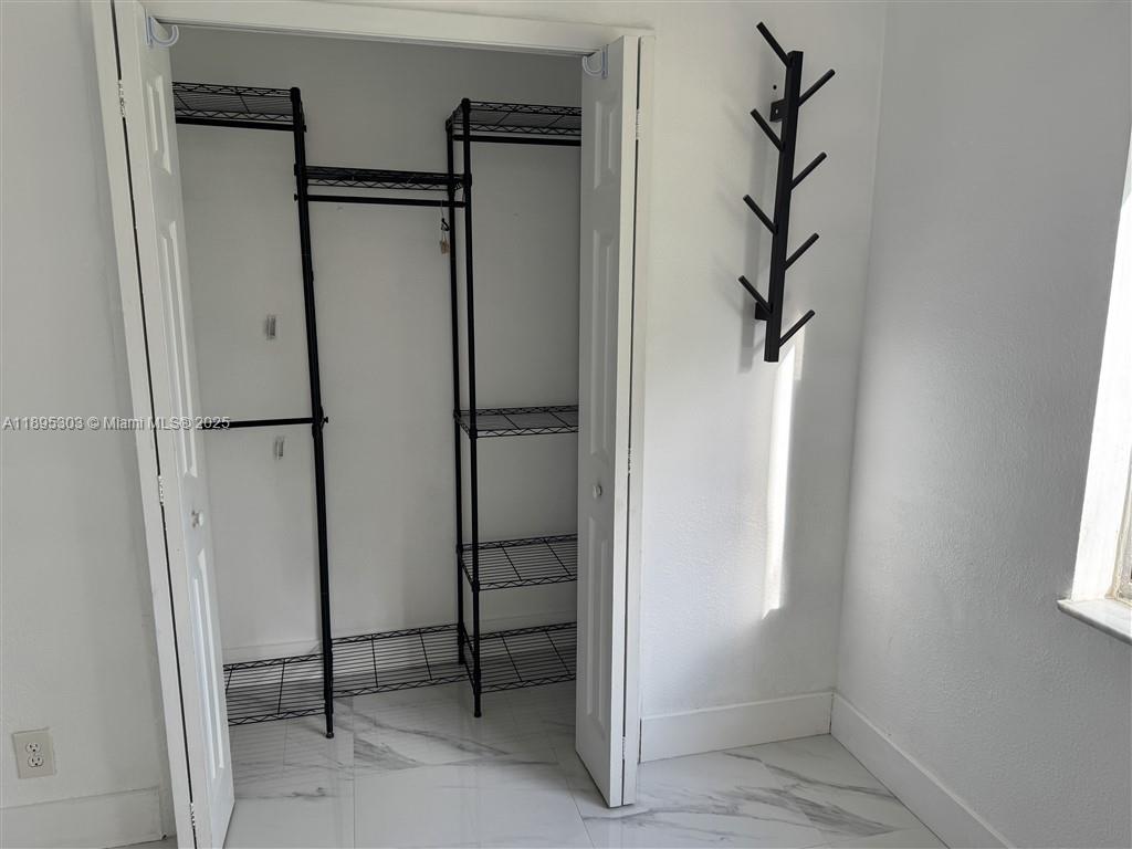 RACQUET CLUB APARTMENTS A - Residential Lease