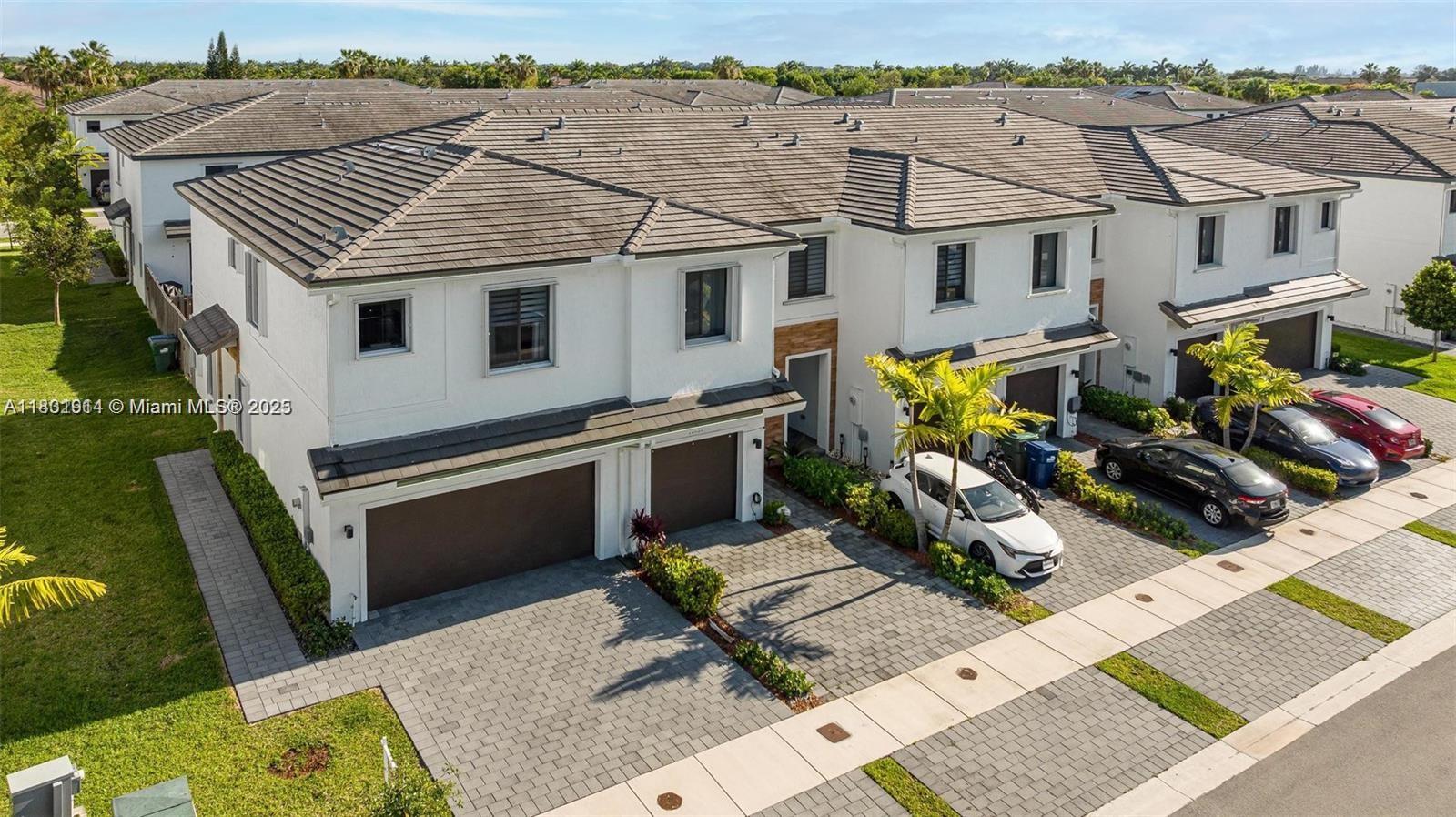 ONLY TWO MONTHS TO MOVE-IN. Stunning townhome with lake front views in the exclusive community of The Landings. This 3 bedroom / 2.5 bath model home features a modern design & a very spacious/open layout. Spacious kitchen with granite countertops throughout, large kitchen cabinets as well as stainless steel appliances. Abundant closet space. ACCORDION SHUTTERS throughout all windows. Over-sized master bedroom with 2 walk-in closets, dual vanities, large corner shower. ONE car garage. Luxury resort-style clubhouse with pool, 2 dog parks & an outdoor fitness area. Washer and Dryer upstairs. Near Black Point Marina, Southland mall, shopping centers, Publix, and Somerset schools & Turnpike expressway. This home is a MUST SEE! Call for a private showing today.