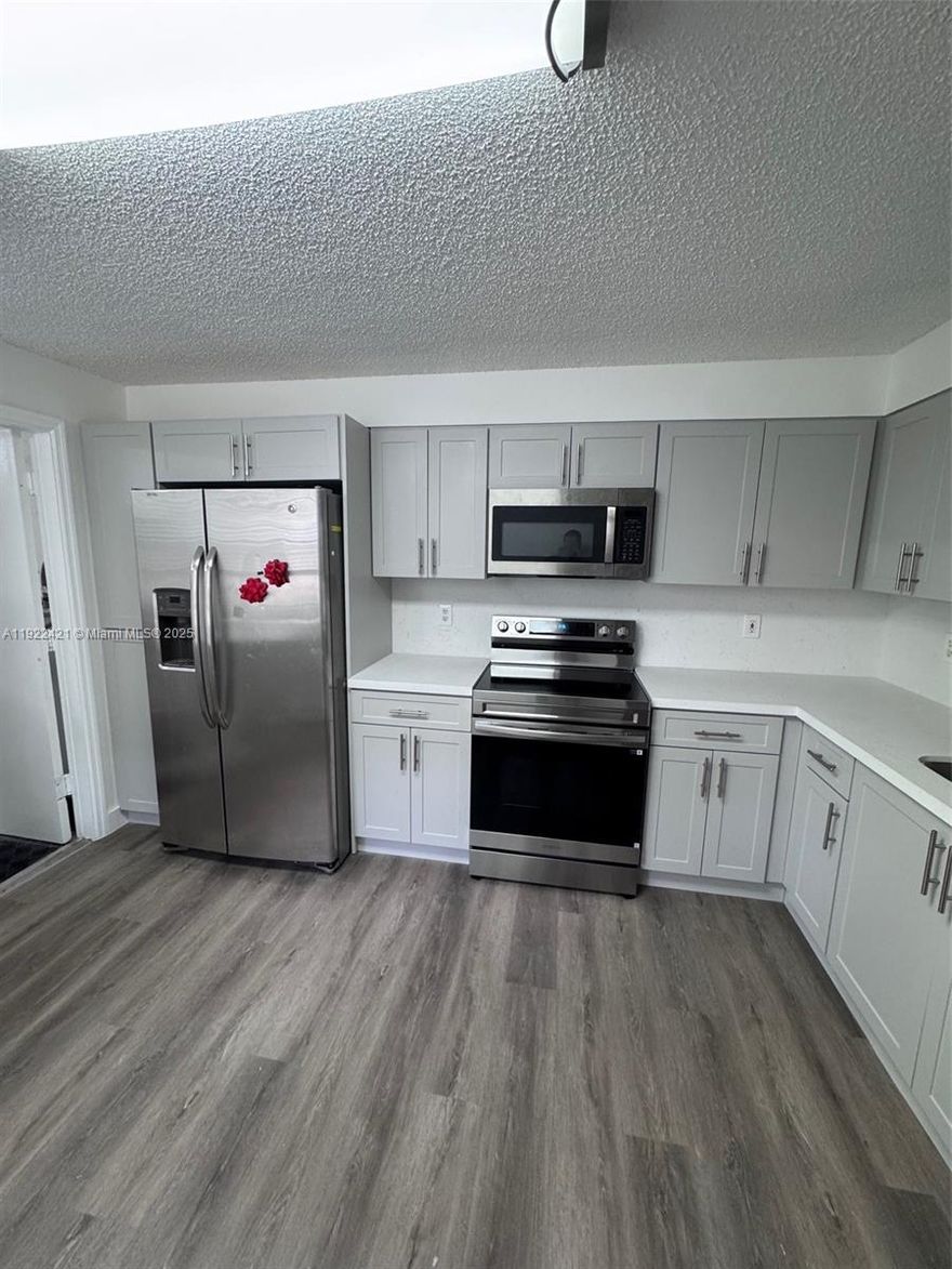 CORNER HOUSE.LIGHT AND BRIGHT 2 BEDROOMS 2 BATHS AND HALF, TWO STORIES HOME, NEW UPDATED.FRESHLY PAINTED. CERAMIC TILES AND LAMINATED FLOORS THROUGHOUT. NEW KITCHEN WITH ISLAND AND DESK AREA.AMPLE LIVING ROOM AND DINING ROOM. NEWLY REMODELED. GARAGE 1 CAR AND SPACE PARKING. DRYER AND WASHING IN GARAGE ACCORDION HURRICAN SHUTTERS.COMMUNITY GATED, COMMUNITY POOL. CLOSE TO SHOPPING, RESTAURANTS AND MAJOR HIGHWAYS TOP RATED SCHOOLS. ASSOCIATION APPROVAL REQUIERED SEE FORM ATTACHED.