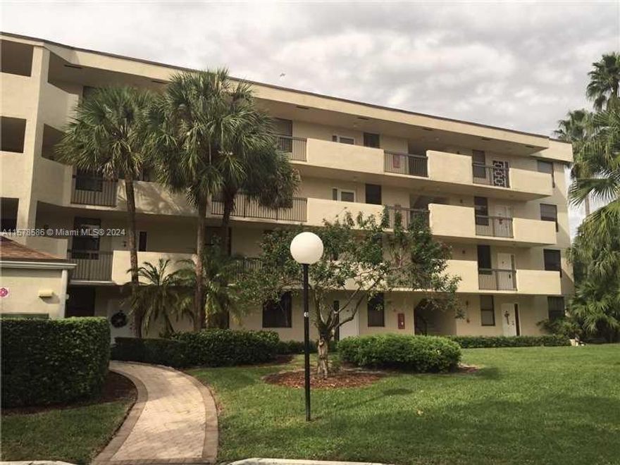 Gorgeous rental in sought after township area of Coconut Creek.  The oversized condo was totally redone a few years ago. Wood (LVP) floors, granite, crown molding, stainless steel appliances. Laundry room with storage and full size washer and dryer.  Rent includes cable, water, sewer, trash and all of the wonderful township amenities. Pool, tennis, basketball, fitness center and clubhouse. Great location near the Promenade. It doesn't get better than this for the price. Association requires a 650 credit score and no pets. Service animals are allowed.  1st, last and security.