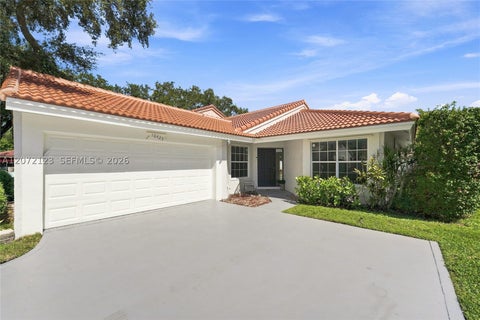 Photo of 10425 NW 9th Mnr, Coral Springs, FL 33071 (MLS # A12072123)