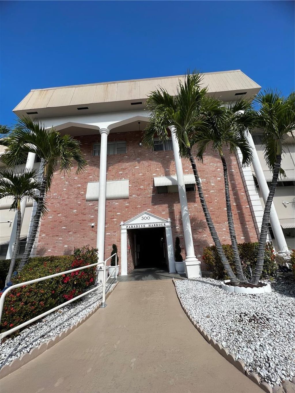 Photo of 300 Golden Isles Dr #217, Hallandale Beach, FL 33009 (MLS # A11336019)