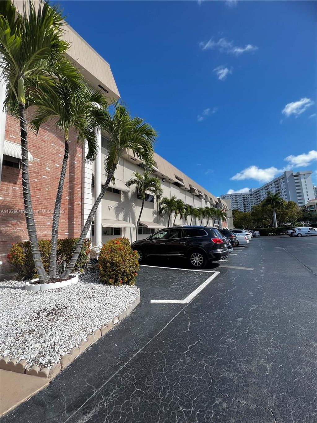 Photo of 300 Golden Isles Dr #217, Hallandale Beach, FL 33009 (MLS # A11336019)