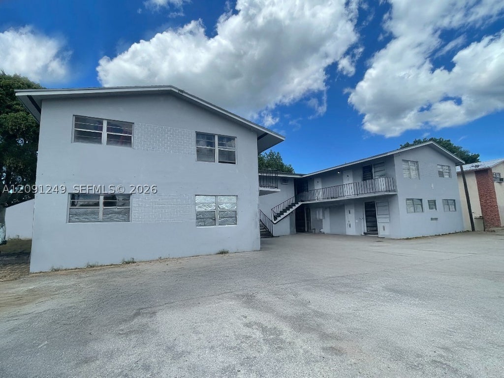 Photo of 332 SW 3rd St #15, Belle Glade, FL 33430 (MLS # A12091249)