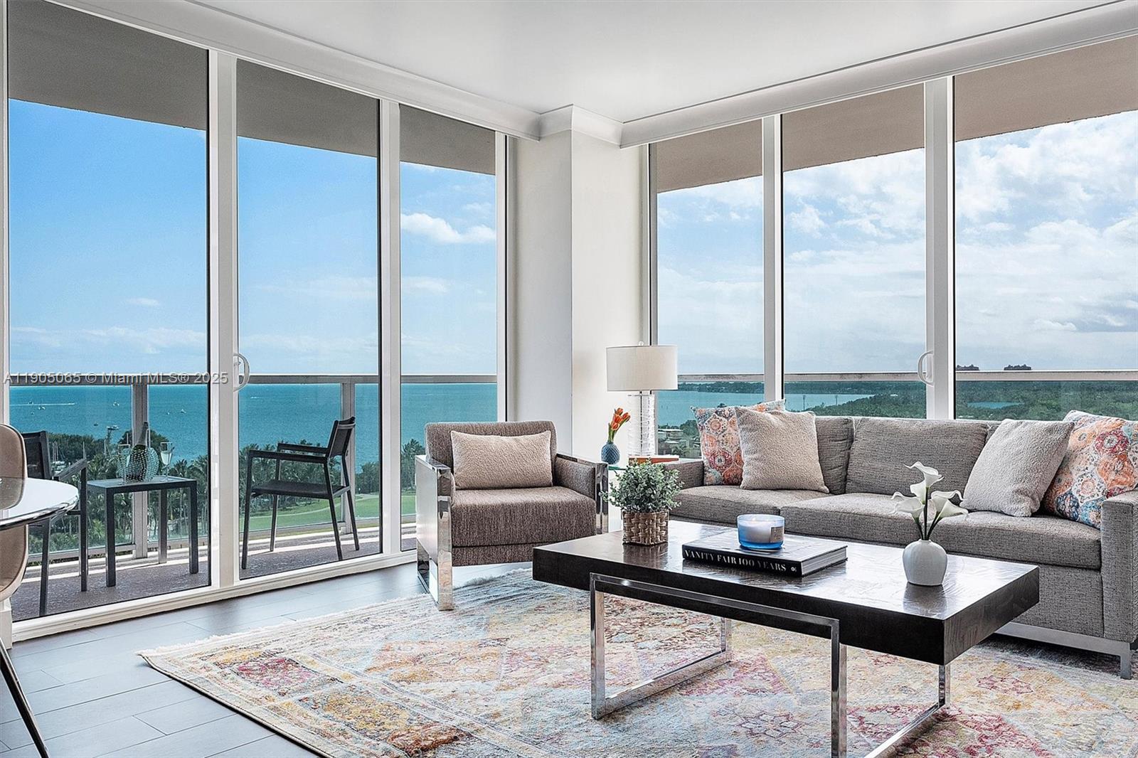 elevated living in this rare offering in the heart of Coconut Grove. This beautifully renovated 2-bedroom, 2-bath residence showcases breathtaking panoramic views of Biscayne Bay and the lush Grove canopy. Thoughtfully designed with high-end finishes throughout, the open layout features a sleek chef’s kitchen, custom cabinetry, premium appliances, and spa-inspired bathrooms.
Floor-to-ceiling glass frames unforgettable sunsets,expansive balcony invites seamless indoor/outdoor living. The primary suite feels like a private retreat with water views and abundant closet space.
Perfect as a full-time residence, seasonal escape, or investment property—this home also offers strong income-producing potential, in a building well-known for flexibility and desirable rental opportunities.